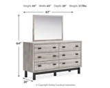 Vessalli King Panel Headboard with Mirrored Dresser and Chest