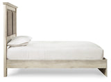Cambeck King Upholstered Panel Bed with Mirrored Dresser and Chest