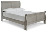 Kordasky Full Sleigh Bed with Mirrored Dresser and Chest