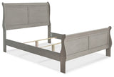 Kordasky Full Sleigh Bed with Mirrored Dresser and Chest