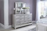 Coralayne King Upholstered Bed with Mirrored Dresser and Chest