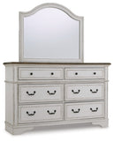 Brollyn King Upholstered Panel Bed with Mirrored Dresser