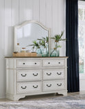 Brollyn Queen Upholstered Panel Bed with Mirrored Dresser