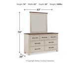 Brewgan King Panel Storage Bed with Mirrored Dresser and Chest