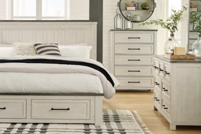 Brewgan King Panel Storage Bed with Mirrored Dresser and Chest