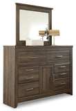 Juararo Queen Poster Headboard with Mirrored Dresser and Nightstand