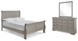 Kordasky Full Sleigh Bed with Mirrored Dresser