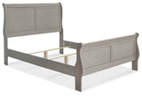 Kordasky Full Sleigh Bed with Mirrored Dresser