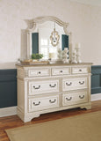 Realyn Queen Upholstered Panel Bed with Mirrored Dresser and Chest