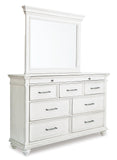 Kanwyn King Panel Bed with Storage with Mirrored Dresser and Chest