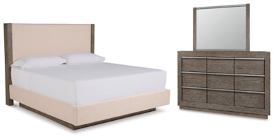 Anibecca King Upholstered Bed with Mirrored Dresser