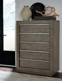 Anibecca King Upholstered Bed with Mirrored Dresser and Chest