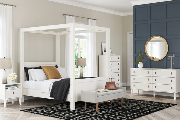 Aprilyn Full Canopy Bed with Dresser, Chest and Nightstand